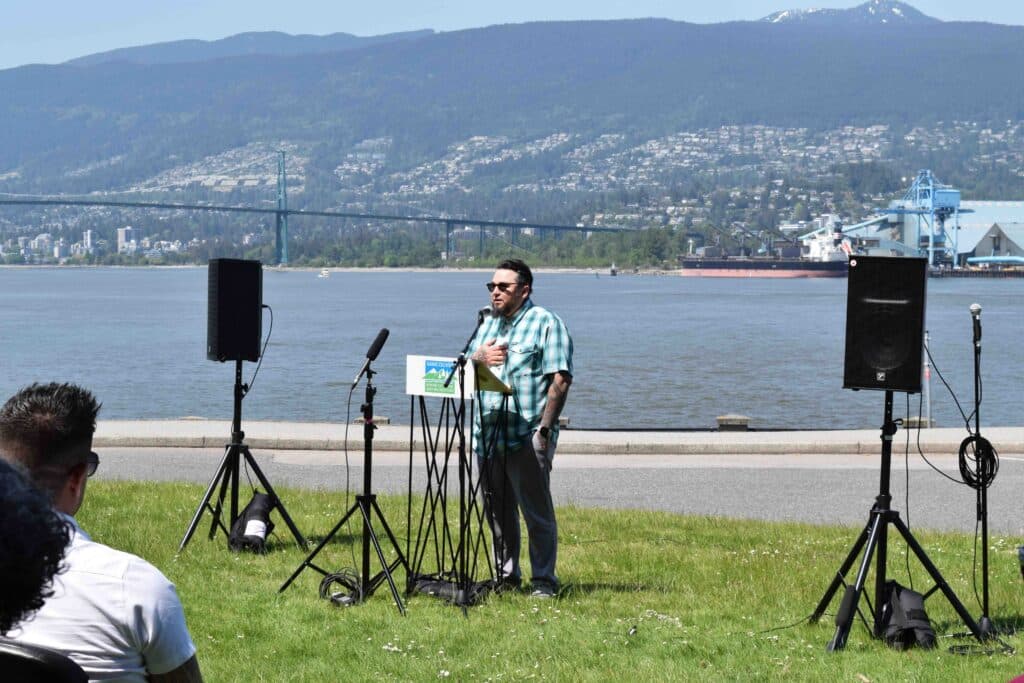 TWN Director Gabriel George shares opening remarks at MST flag raising event at spapəy̓əq Pápiy̓eḵ